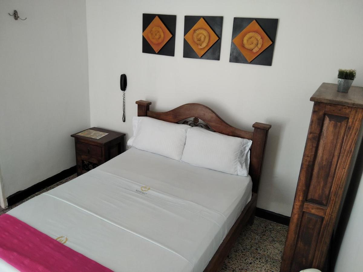 Hotel Maceo เมลการ์ ภายนอก รูปภาพ